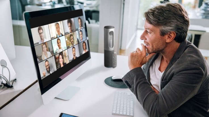 zoom-video-conferencing-online-meeting-remote-workers-one-user-connected-via-laptop-with-a-grid-of-twelve-participants-on-screen-2400x1600-100837446-large-768x432.jpg